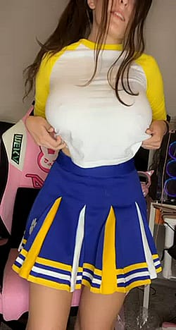 This Cheerleader Knows How To Hide Her 32GGs Well ???'