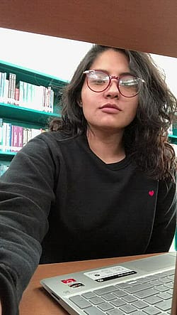 Showing Tits In Library'