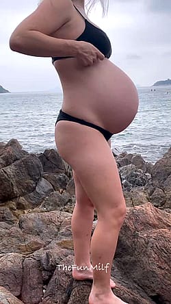 Don’t ever misjudge the pregnant milf at the beach!'