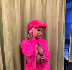 Nicki Minaj's Big Tits and Booty: A Pink Outfit and Phone Call'