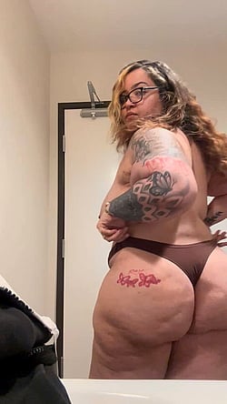 Front Desk Tease: Natural Tits and Ass'