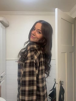 Busty Brunette Teasing Her Small Tits'