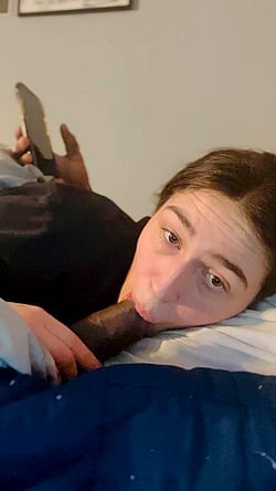 Girl Gives Blowjob to Man Playing Game'
