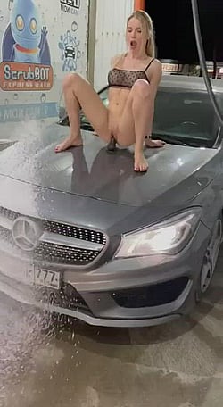 Wet Babe Riding Car with Dildo and Toy'