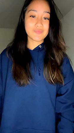 18-Year-Old Petite Teen Flashes Her Smile'