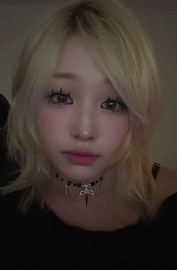 Asian Blonde Girl Staring at You'