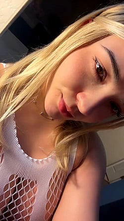 Blonde Babe Shaking Her Ass and Sticking Her Tongue Out'